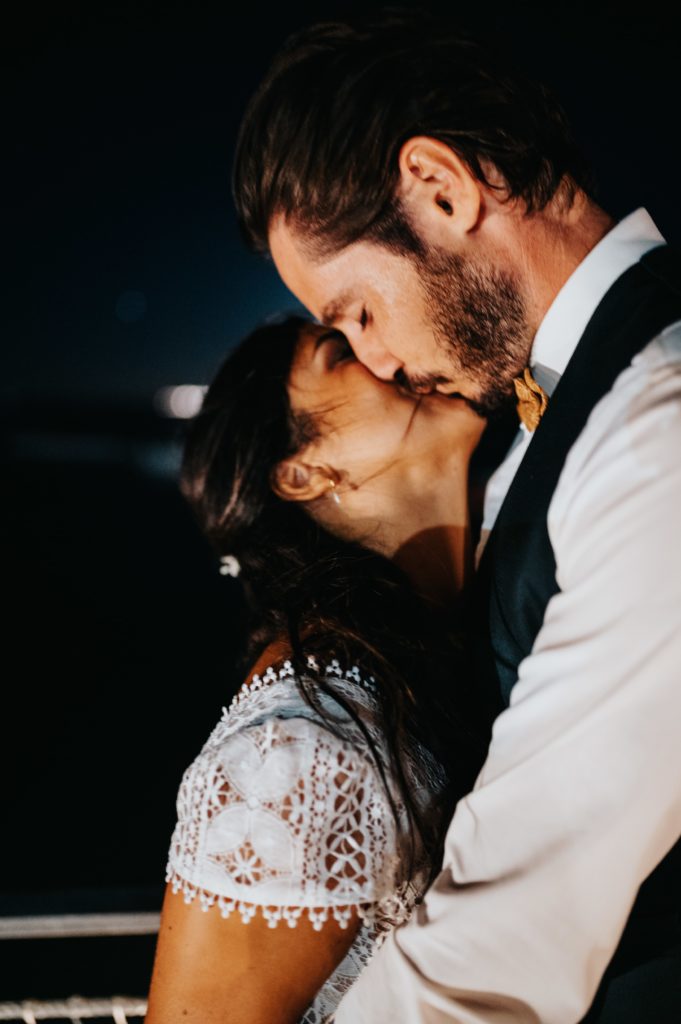 bride and groom kissing